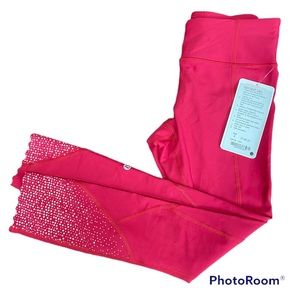Lululemon Tight Stuff Tight *Reflective
Cranberry size 4 NWT